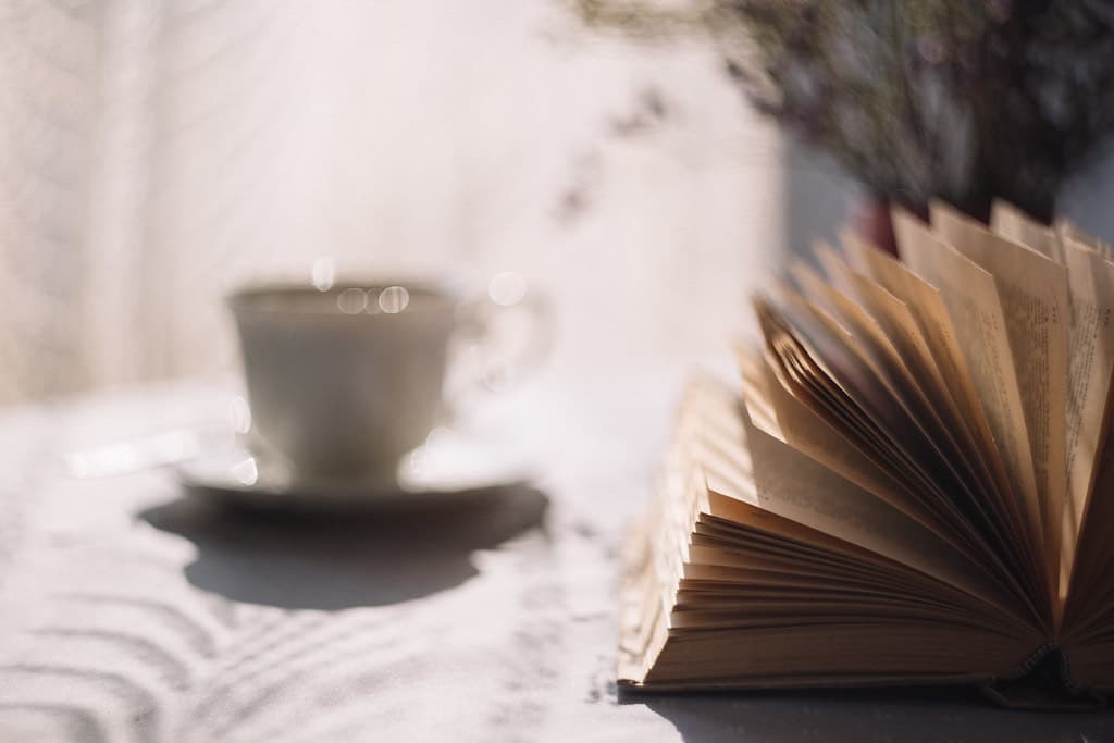 An open book on a reading table